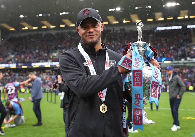 Vincent Kompany lifting the Championship Trophy for Burnley (Credit: Getty Images)